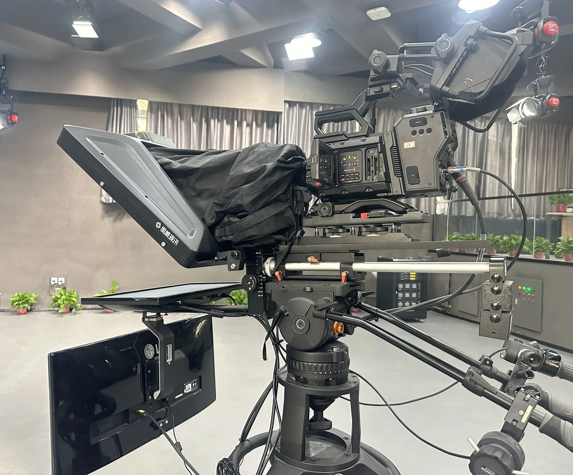 Studio Teleprompter Ultra side view mounted on a Blackmagic studio camera